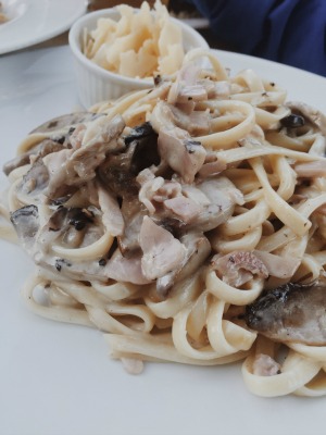 pasta served with mushrooms,ham and cheese, finished off with a large drizzle of cream sauce