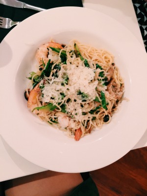 pasta adorned with jumbo prawns